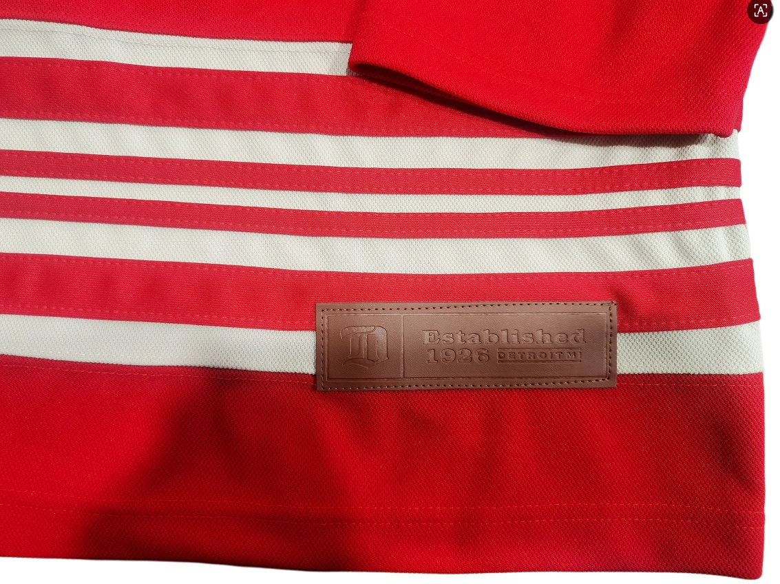 Archive Review: Detroit Red Wings Centennial Premium NHL Hockey Jersey Details detroit red wings centennial premium nhl hockey jersey hem label front