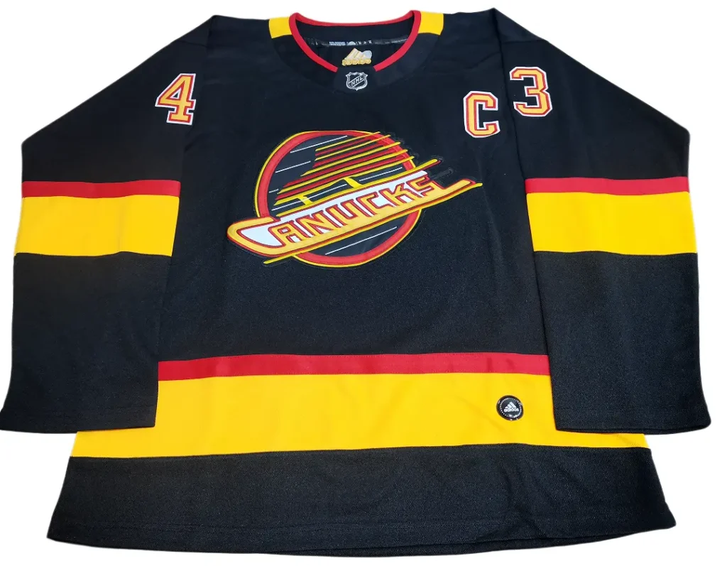Vancouver Canucks Black Alternate Hockey Jersey: Technical Review vancouver canucks black alternate hockey jersey front